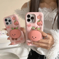 Rear view of Kawaii Peach iPhone Cases being held by a woman