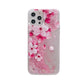 Phone case with pink cherry blossom design on a white background