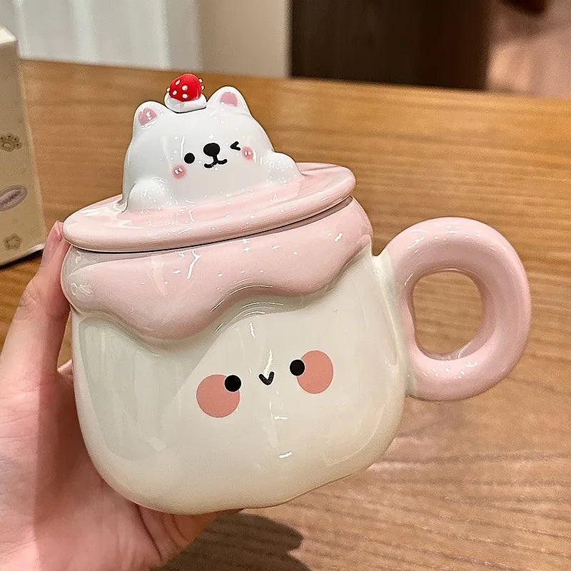 Kawaii Animal Pudding Ceramic Mug  being held by a woman on a countertop in white and pink 