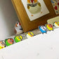 Colorful cartoon-style bird stickers  on a clear background