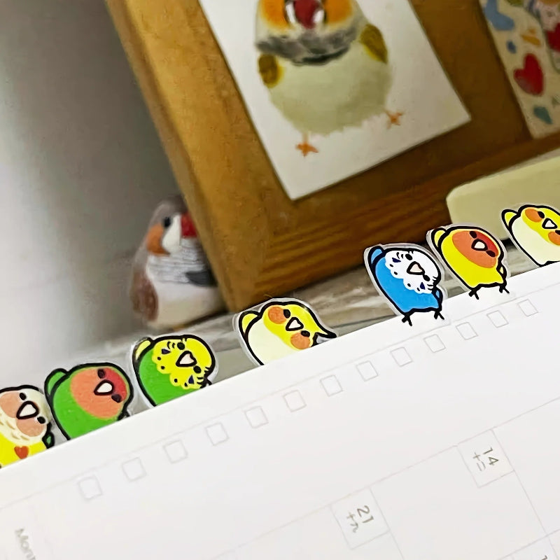 Colorful cartoon-style bird stickers  on a clear background