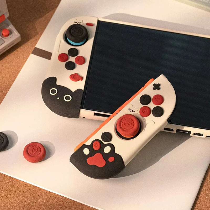 Gaming controller with cat-themed design on a white surface