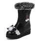 Black winter boot with fur trim and decorative elements on a white background