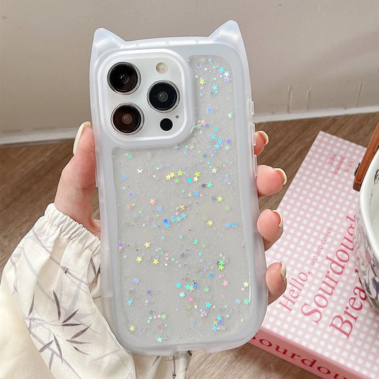 Clear phone case with star patterns held by a hand, with a blurred background