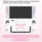 White gaming console with cat ears silicone Joycon cover and bow tie printed backplate on a pink background.