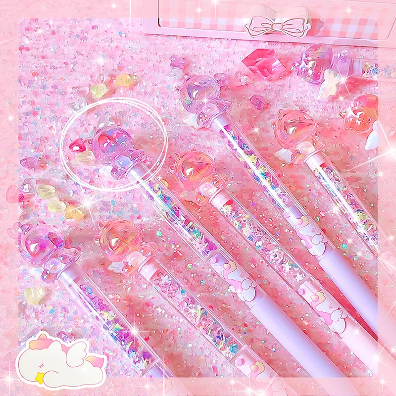 Decorative pens with glittery accents on a pink background