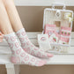 Model Wearing Pink and White Heart Socks