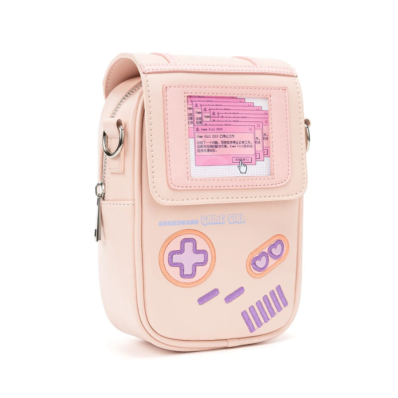 Pink crossbody bag with gaming console design on a white background