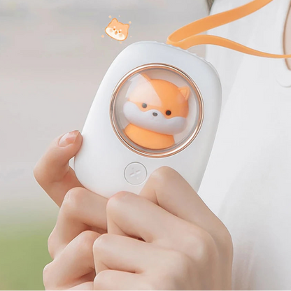 Hand holding a white device with a kawaii shiba inu face.