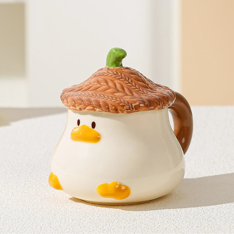Kawaii Duck Mug with brown Lid on countertop 