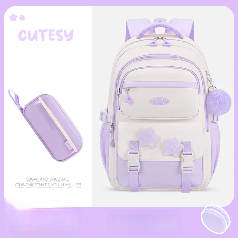 Light purple backpack with star designs and a matching pencil case on a light purple background.