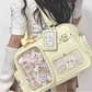 Kawaii pastel yellow Display Window Crossbody Bag worn by a woman 