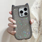 Phone case with star glitter design held by a hand against a neutral background
