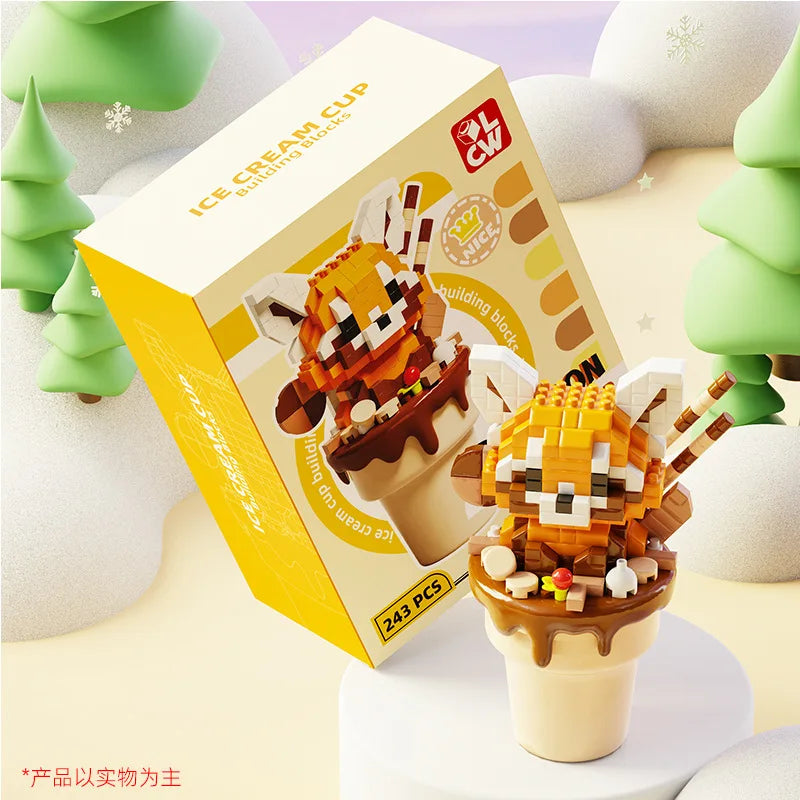 kawaii ice cream building block animal red panda edition displayed on a snowy background along side its box.