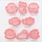 Set of pink sea creatures -shaped cookie cutters with dimensions displayed below each.