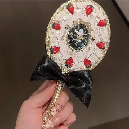 Strawberry Cupid Hand Mirror in Black