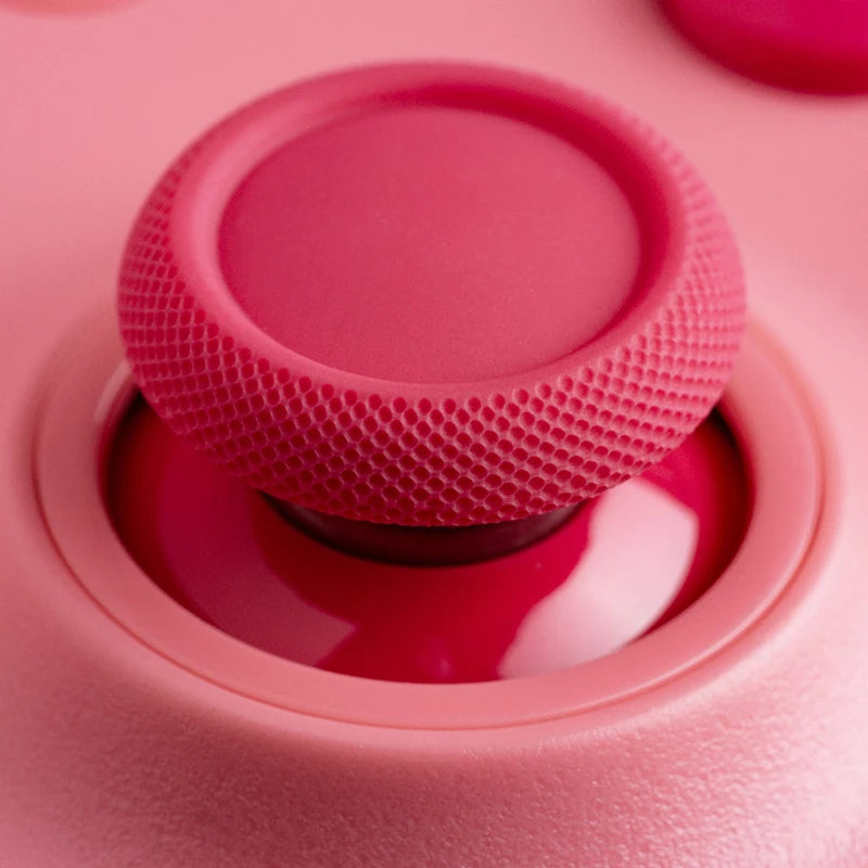 Close-up of a pink textured object with a circular design