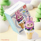 kawaii ice cream building block purple rabbit edition displayed on a snowy background along side its box