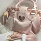 Kawaii Sweet Heart Lock Bag Pink on countertop 