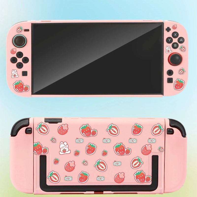 Pink gaming console with strawberry pattern on a gradient background
