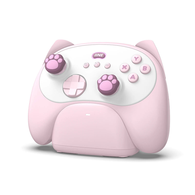 Pink gaming controller shaped like a cat with paw buttons on a white background