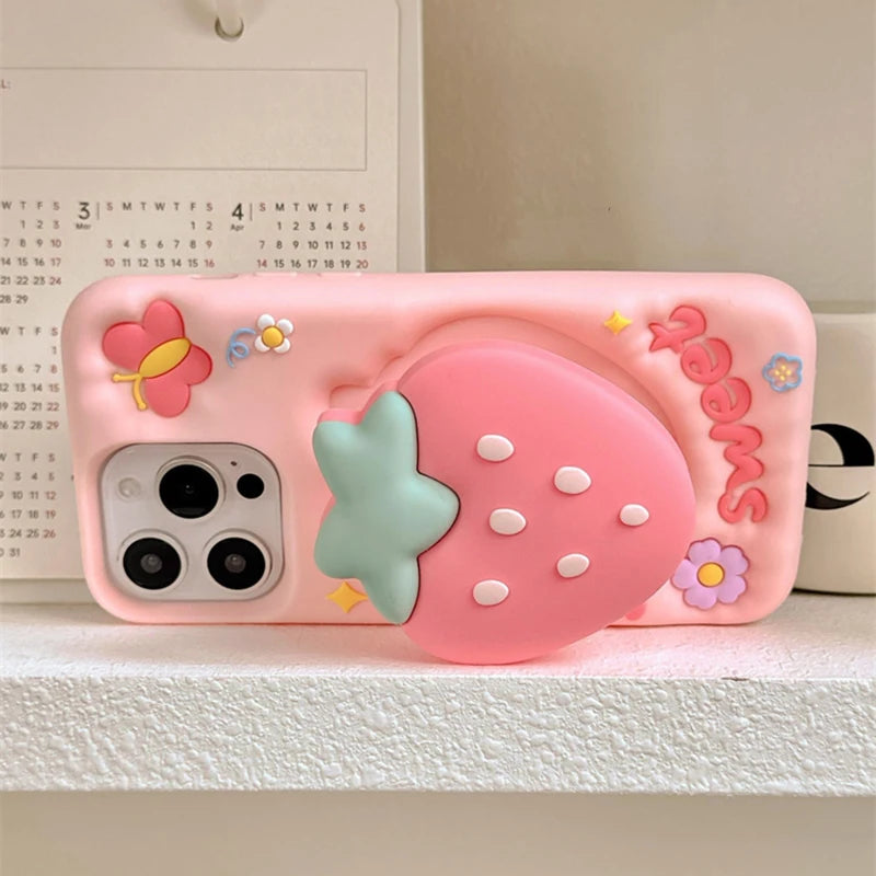 Rear view of Kawaii Sweet Strawberry Butterfly iPhone Case held on a shelf 