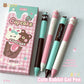 Cupcake-themed gel pens with packaging on a light grey background
