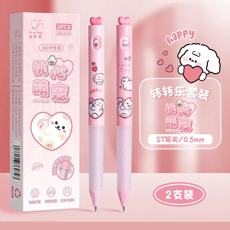 Two pink pens with cartoon designs and packaging on a pink background