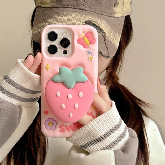 Rear view of Kawaii Sweet Strawberry Butterfly iPhone Case held by a woman