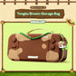 Brown storage bag with a cat-themed charm on a green background, featuring the brand 'Ruralcat'.