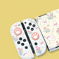 Gaming controller with rabbit and flower design on a yellow background
