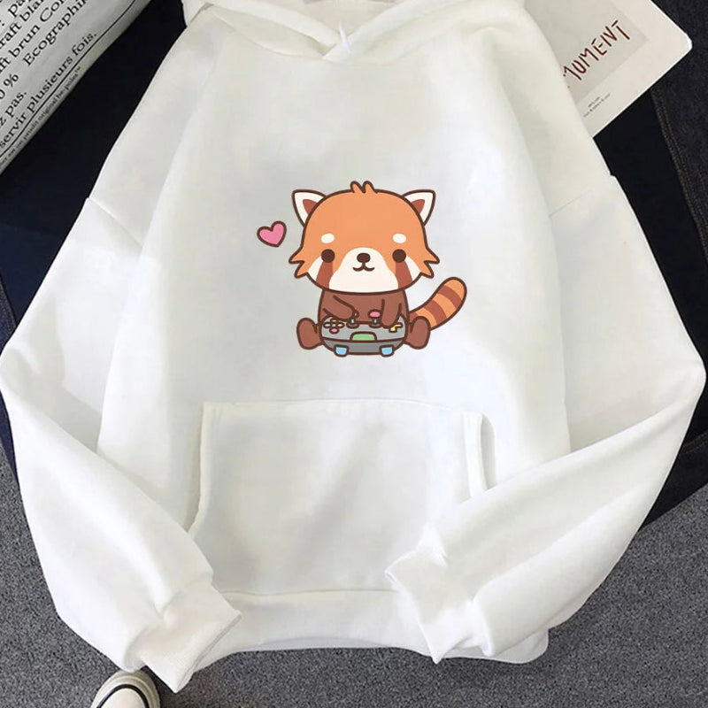 White hoodie with a red panda design on a dark surface