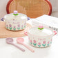 Kawaii purple and pink Flower Raman Bowl Set  with glass lids and spoons on a countertop