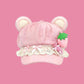 Pink hat with bear ears and strawberry decoration 