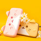 Two cute animal-themed Nintendo Switch  cases on a yellow background with flowers.