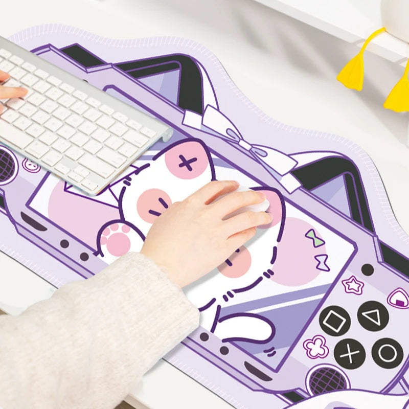 Person using a keyboard on a decorative desk mat with kawaii character design