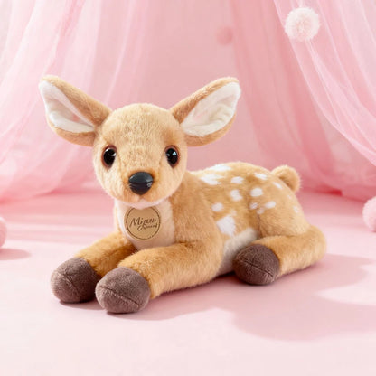 Plush deer toy with a pink background