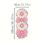 Pink and white floral bath mat with dimension markings showing a height of 100cm (39.37 inches) and a width of 40cm (15.