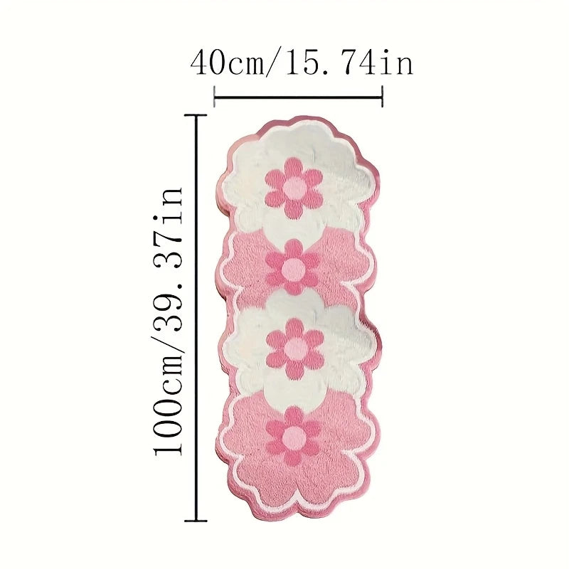 Pink and white floral bath mat with dimension markings showing a height of 100cm (39.37 inches) and a width of 40cm (15.