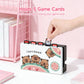kawaii capybara watermelon switch case the white design which is now displaying the dock case that comes with it having the same capybara design as the switch case holding game cards, on a white desk.