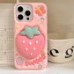 Rear view of Kawaii Sweet Strawberry Butterfly iPhone Case  on a countertop 
