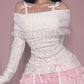 Front view of a Kawaii Coquette Off Shoulder Ribbon Sweater modeled by a woman in white 