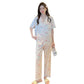 woman stood up wearing  Cute Peach Print Lace Trim Pajamas, the set with trousers