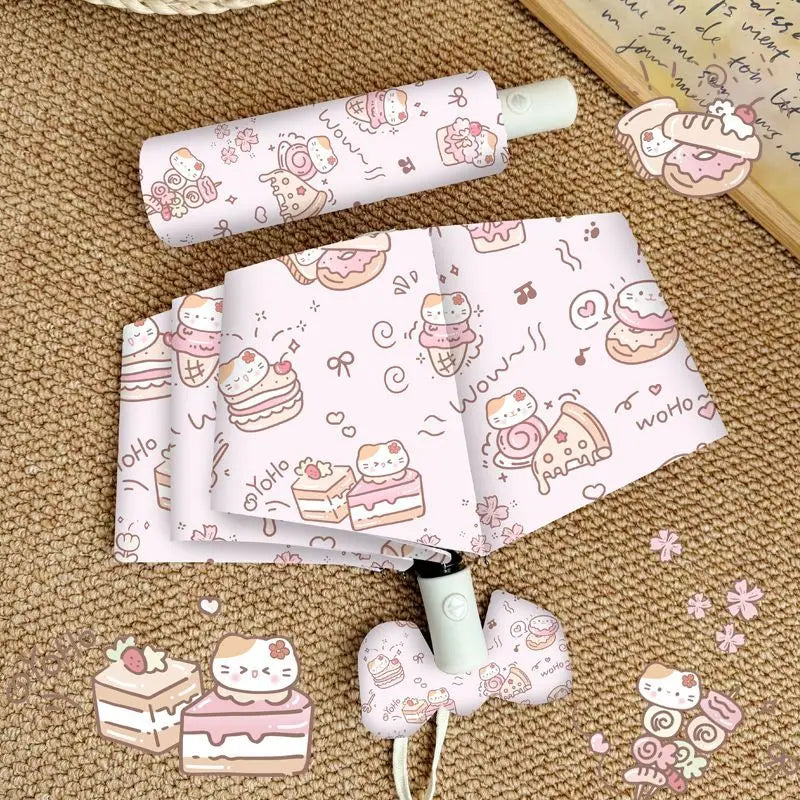 Cute cartoon-themed umbrella with a matching pouch on a textured surface.