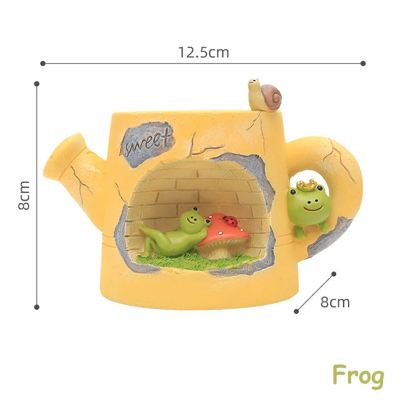 Yellow teapot-shaped container with frog design and measurements on a white background