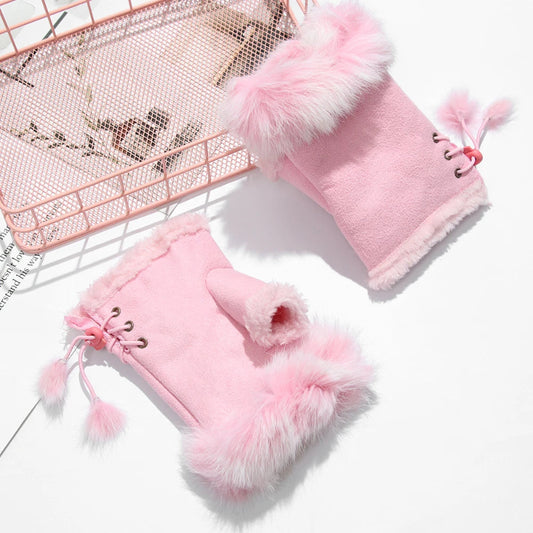 Pink fingerless gloves set with fur trim on a white background