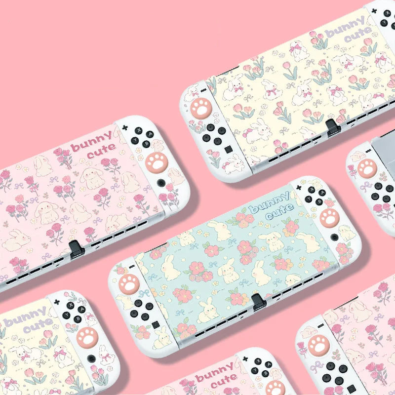 Nintendo Switch cases with cute animal patterns on a pink background