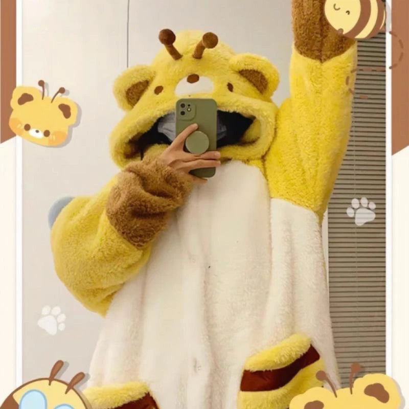 Person wearing a yellow and brown animal-themed onesie taking a mirror selfie.