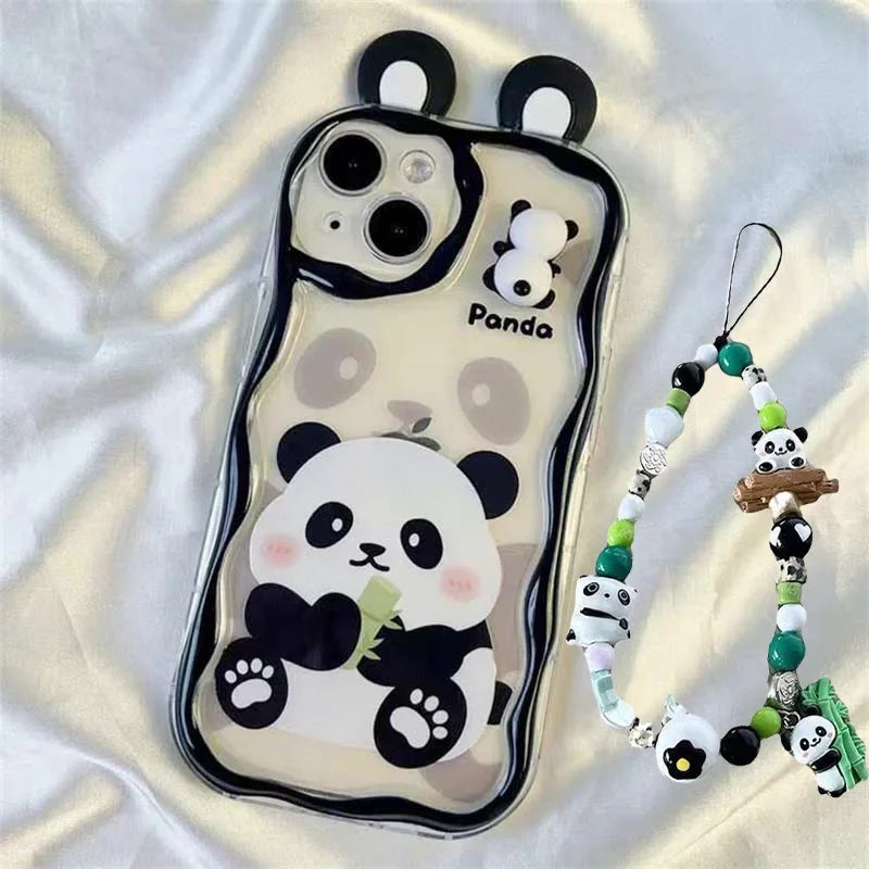 kawaii panda samsung phone case with beaded charm attached and ears on a white silk background, panda on the phone case is sat eating bamboo