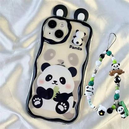 kawaii panda samsung phone case with beaded charm attached and ears on a white silk background, panda on the phone case is sat eating bamboo